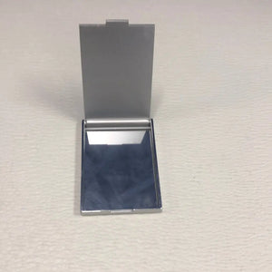 
                  
                    Women’s Compact Mirror. Closable, Labeled Women's Center at Riverview.
                  
                